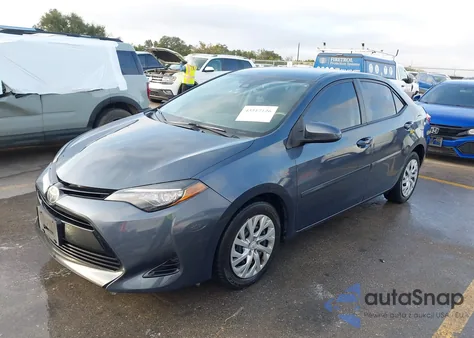 2017 Toyota Corolla Le z USA, uszkodzony, nr VIN 5YFBURHE8HP575868